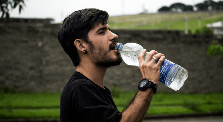 Unhealthy Eating Habits-Drinking from plastic bottles